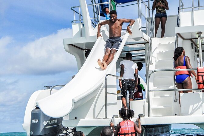 Bavaro Punta Cana EN boat party with drinks and transportation - Getting on board: pickup, mobile tickets, and the group size feel