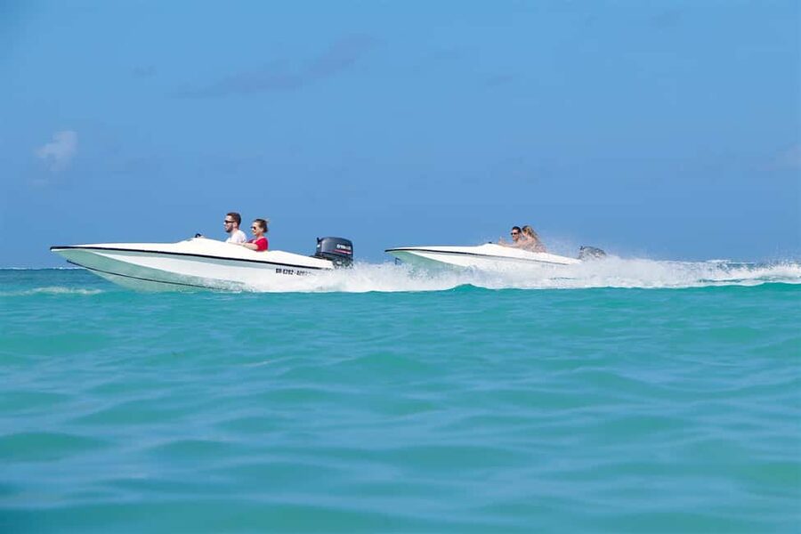 Bávaro: Speed Boat and Snorkeling Trip - Stop one, the Bavaro natural pool: shallow and calm for 25 minutes