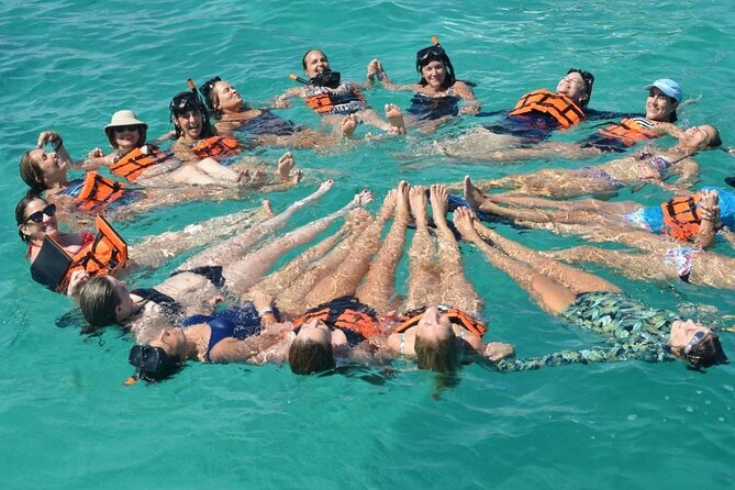 Catamaran and Snorkeling Party with Drink Included in Punta Cana - Drinks, Music, Fruit, and Nachos: The Onboard Party Formula