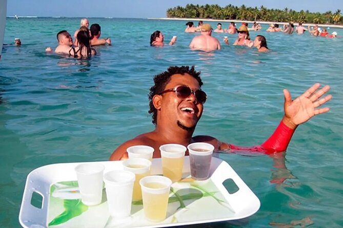 Catamaran party in Punta Cana with open bar, music and more - Getting on board: pickup, mobile ticket, and the first momentum