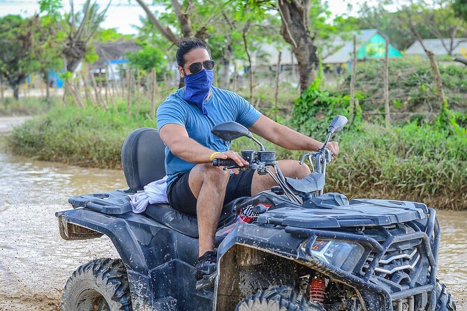 Explore Macao Beach with ATV Tours Punta Cana - Macao Beach: waves, limestone cliffs, and real downtime