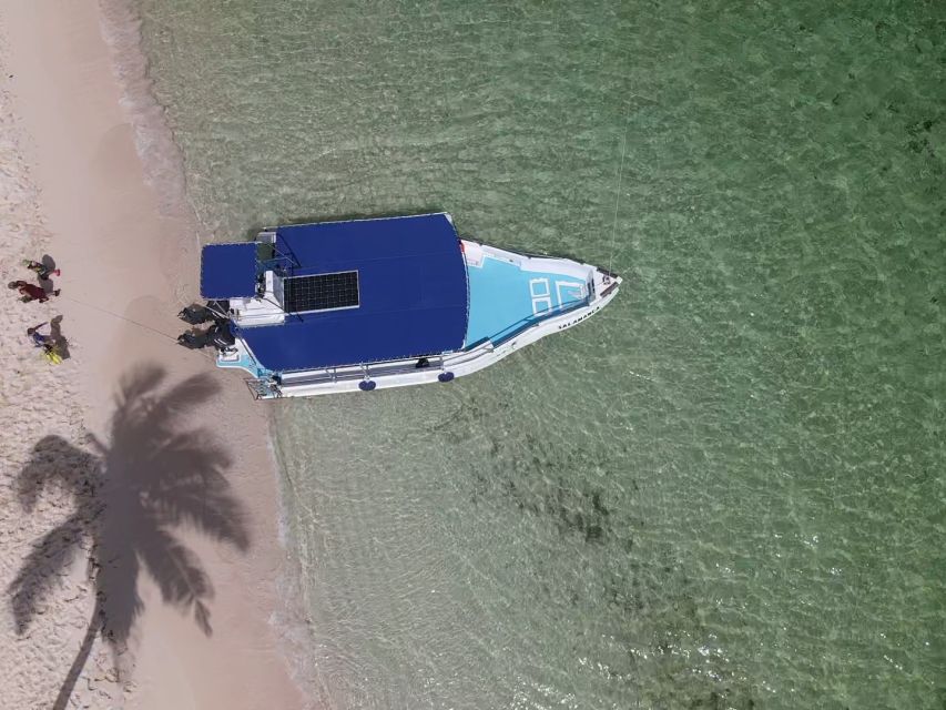 From La Romana: Saona Island for Aida Cruises Passengers - The natural pool finish: shallow water, starfish, drinks