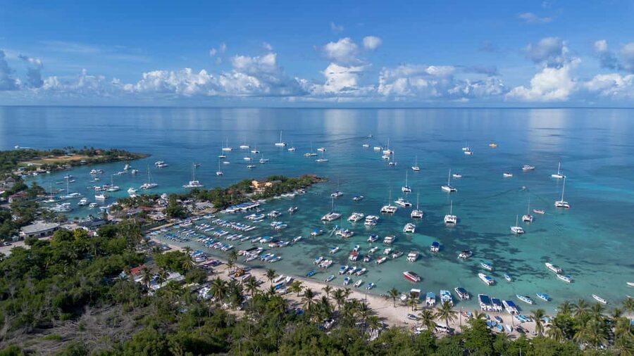 From Punta Cana: Catalina Island Swim, Sail & Snorkel - The Chavon River cruise: jungle gorge scenery with a party vibe