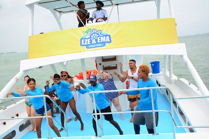 From Punta Cana: Party Boat + Snorkeling Live Music Drink Open B - The sandbar anchor and floating bar moment