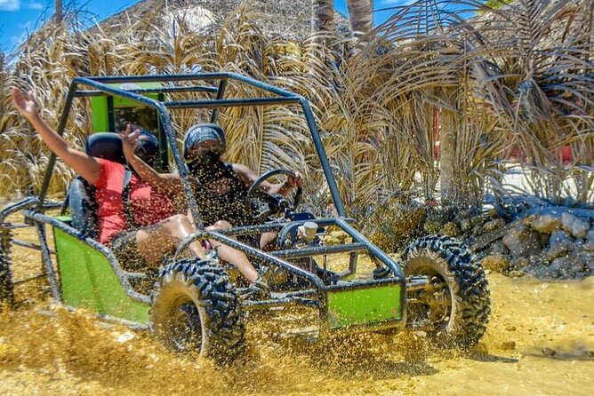 From PuntaCana: Tour in buggy double With Cenote and macao beach - Cueva Taina: Easy Access, Public Entry, Real Water