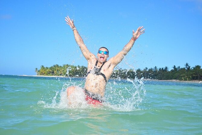 Full Day ATV Experience and Booze Cruise with Open Bar - Snorkeling catamaran cruise with open bar, music, and a natural pool
