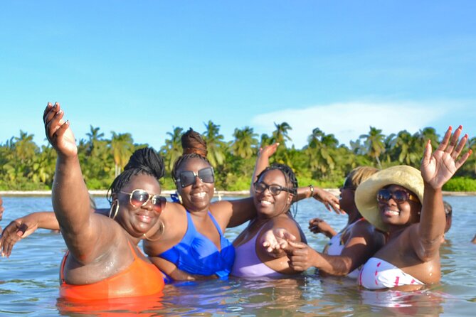 Half-Day Snorkeling Cruise and Natural Pool with Open Bar - Catamaran cruise comfort: bathroom, lounge spots, and a party layout