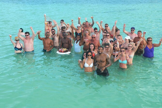 Happy Hour Party Boat With Snorkeling - Snorkeling in Sousa Bay: Two Stops Over Coral Reef Life
