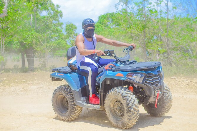 Horseback Riding and ATV or Buggy to Water Cave and Macao Beach - Macao Beach: sand, cliffs, and vendor pressure