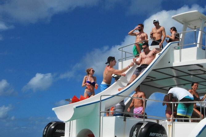 Party Boat /View Dolphins / Snorkling /Free Drinks and Transportation - Getting There: Pickup, Waiting, and How Not to Get Stuck