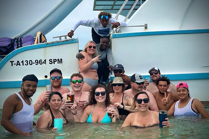 Private Catamaran Cruise with Slide & unlimited drinks - Semi-private beach time: swim, sunbathe, and take photos without stress
