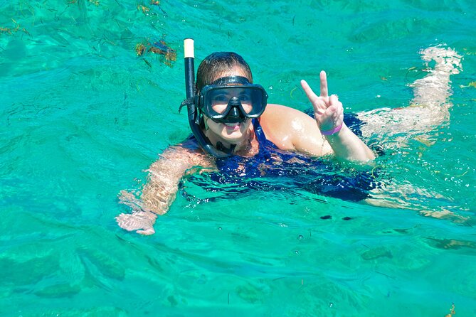 Private Catamaran wonderful Snorqueling slide & entartaiment team - Drinks, snacks, and music of your choice