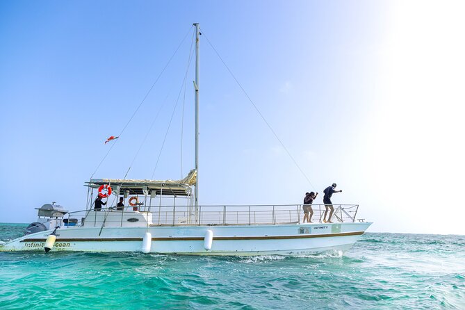 Private Sunset Cruise in Punta Cana - Food and drinks you actually get: champagne plus lobster and shrimp skewers