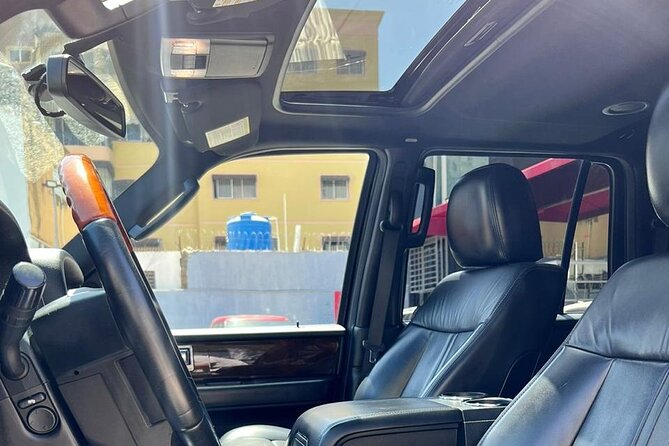 Punta Cana Airport Transfer: Luxuty Ride to Your Hotel - Meeting your driver in Punta Cana arrivals, with a mobile ticket