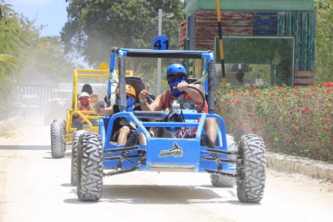 Punta Cana Buggy Tour, Blue Lagoon, Dominican Village and Lunch - Blue Lagoon Cenote Swim: Cooling off where the tour turns fun to refreshing
