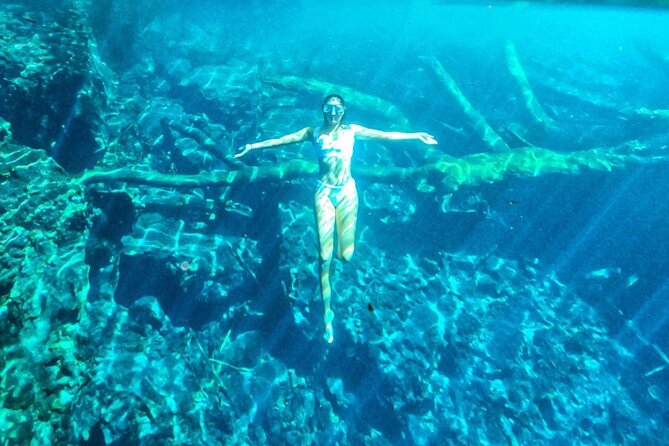 Punta Cana Cenote Hoyo Claro Hiking Tour + Juanillo Beach - Juanillo Beach in Cap Cana: a proper swim break, passport copy ready