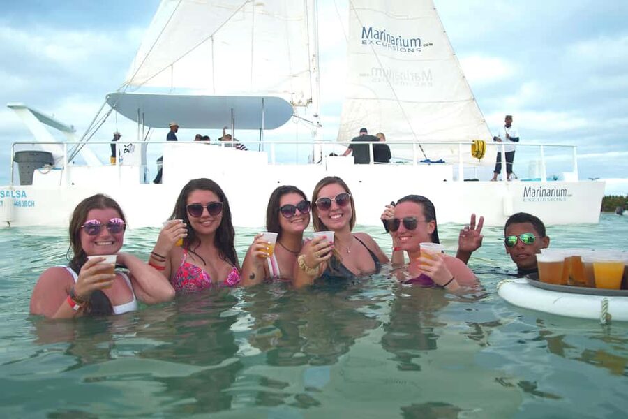 Punta Cana Happy Hour Sailing Cruise - Sunset From Trampolines and the Dance-Focused Return