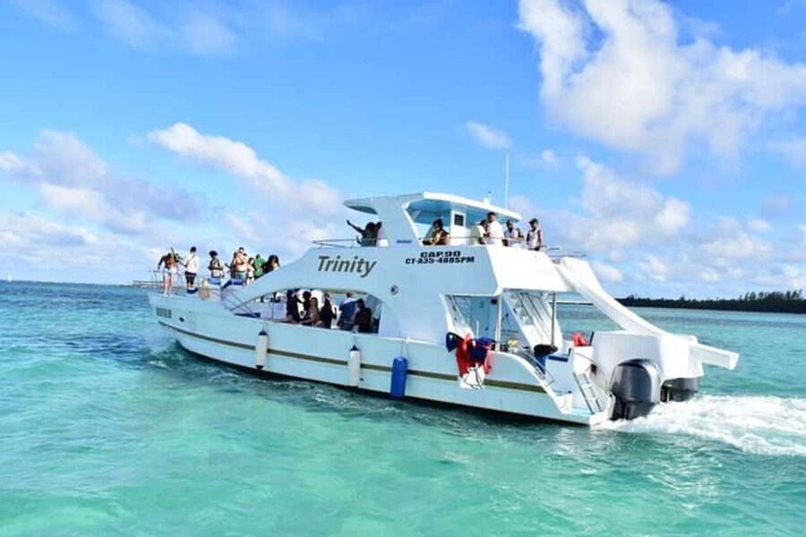 Punta Cana: Hip Hop Party Cruise w/Open Bar (Adults Only) - Boarding the catamaran: two floors, a water slide, and an early splash