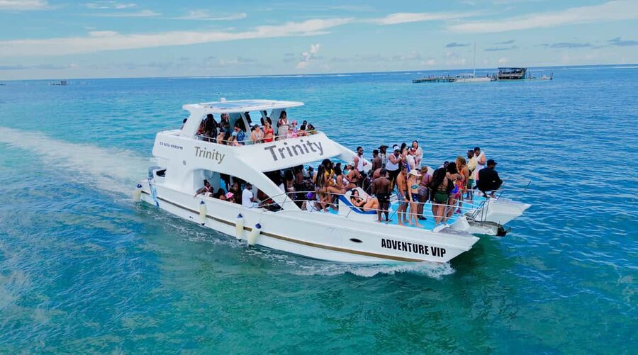 Punta Cana: Party Boat with Snorkeling, Open Bar And Hip Hop - The catamaran experience: open bar, snacks, and the DJ-led energy