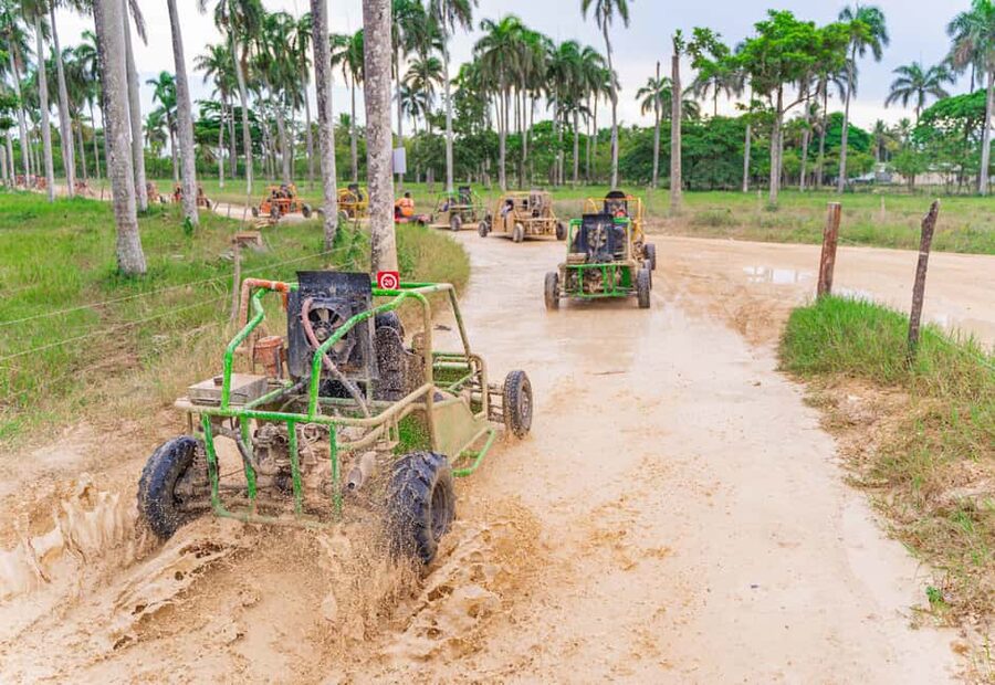 Punta Cana: Saona Island and Buggy Combo - Day Two buggy driving in the Dominican countryside, with El Hoyo Cave and Macao Beach