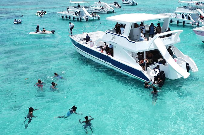 Punta Cana Shared Party Boat Booze Cruise and Snorkeling - Stop one at Bavaro Reef: how the snorkeling part works