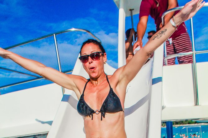 Punta Cana VIP Party Cruise with Snorkeling & Double Slide - Onboard Vibes: DJs, Games, and the Open Bar Effect