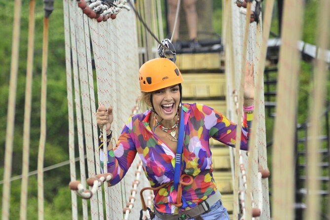 Punta Cana Ziplines, Hanging Bridge, and Waterfall Pool Adventure - At the Adventure Park: Six Lines, Hanging Bridge, and a Blue Lagoon Cenote Route