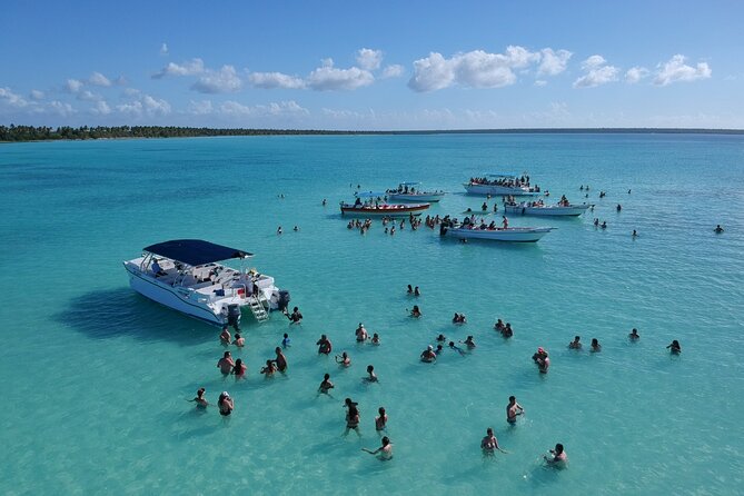 Saona Island Catamaran Cruise Experience (All Inclusive) - On the catamaran: music, snacks, and an open bar rhythm