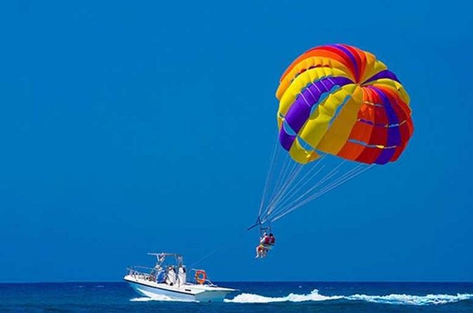 Snuba Snorkelking Parasailing and Catamaran Pack - Catamaran Party Boat Energy: Good Music, Animation, and Swimming Breaks