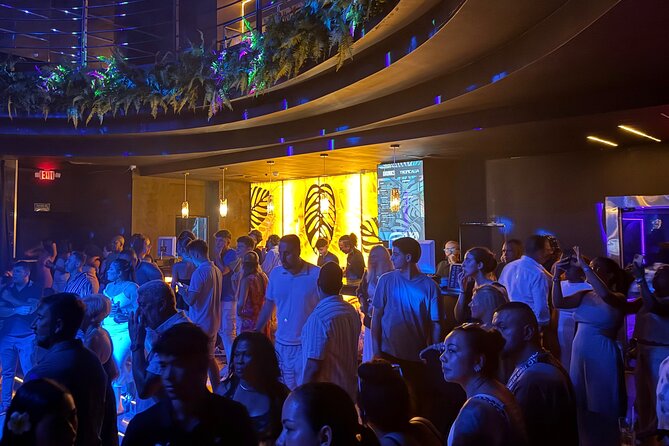 Tropicalia Disco – Party Night – Nightclub - The dance floor energy, lights, and a modern club feel