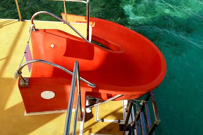 VIP Catamaran with Snorkeling - Photo services, towels, and small extras to budget